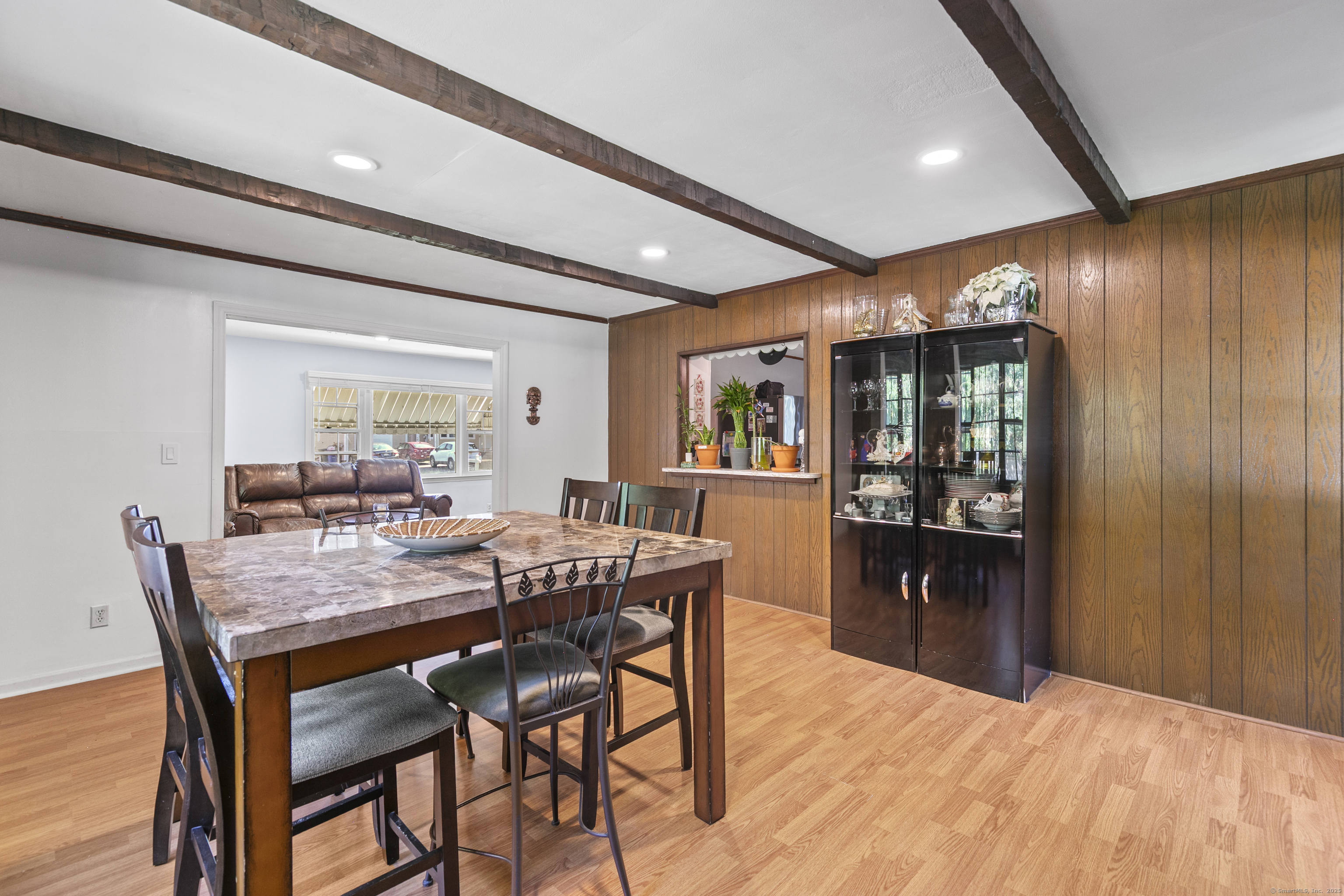 66 Loftus Circle Trumbull, CT 06611 - Photo 9 of 40 a dining room with furniture and window
