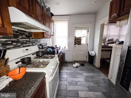 a view of balcony with wooden floor