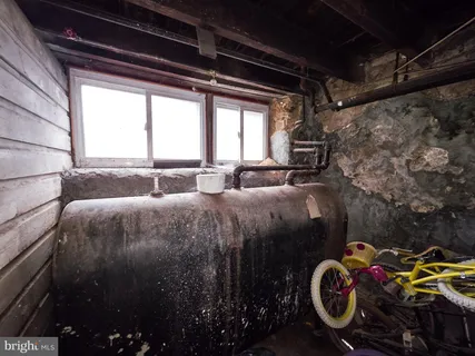 a bathroom with a shower and a toilet