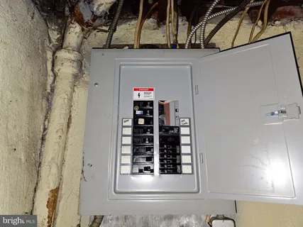 a bathroom with a glass door shower