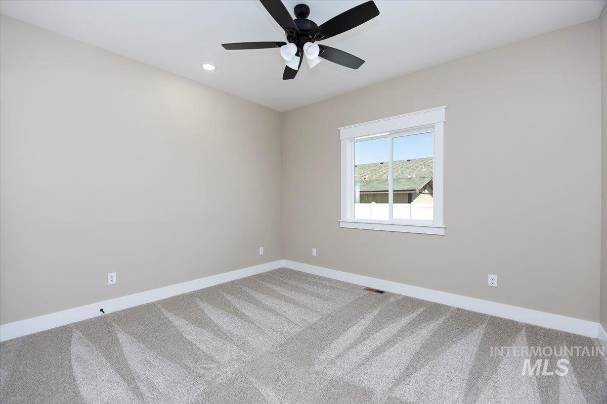 231 Sandi Road Twin Falls, ID 83301 - Photo 23 of 31 Unfurnished room featuring carpet, recessed lighting, and ceiling fan