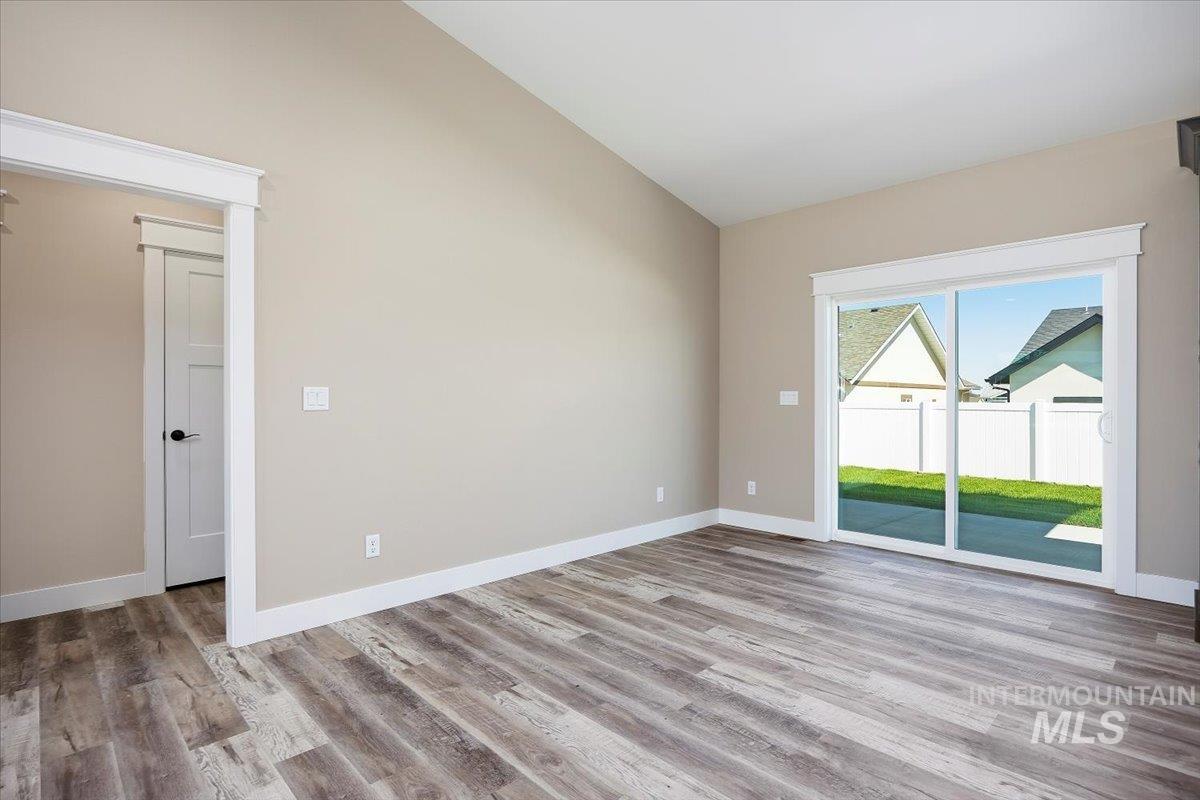 231 Sandi Road Twin Falls, ID 83301 - Photo 6 of 31 Empty room featuring light wood-type flooring and baseboards