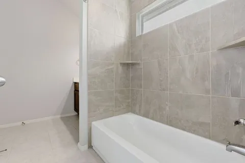 a bathroom with a bathtub