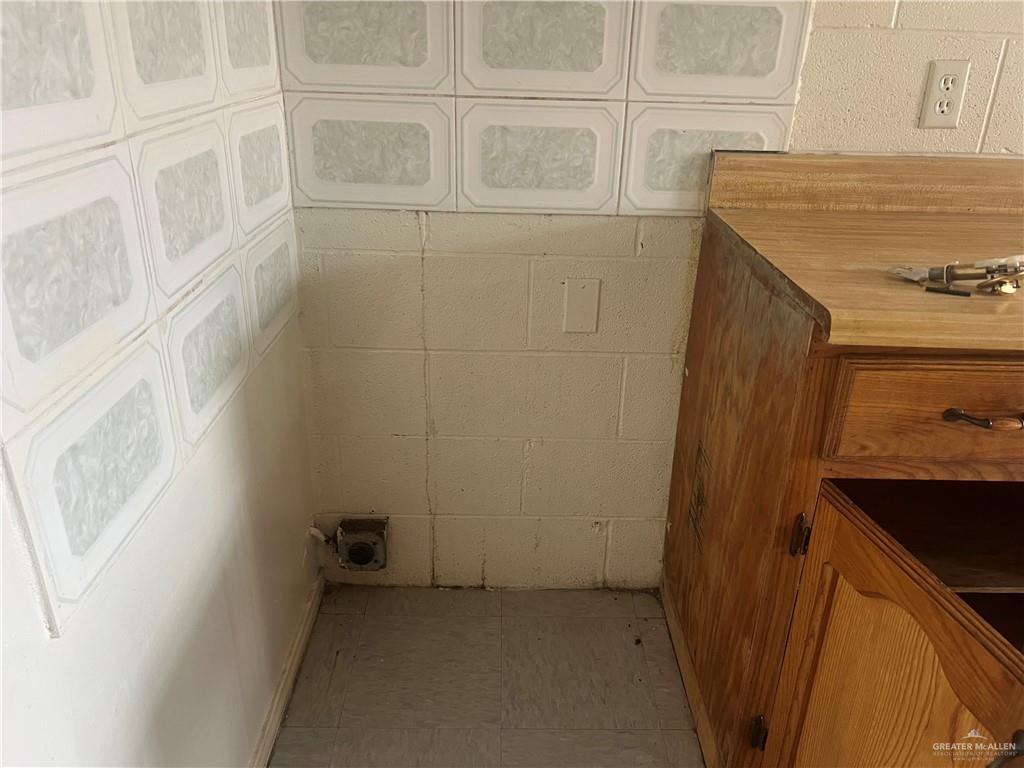 5020 La Homa Road Mission, TX 78574 - Photo 11 of 28 a bathroom with a sink and a mirror