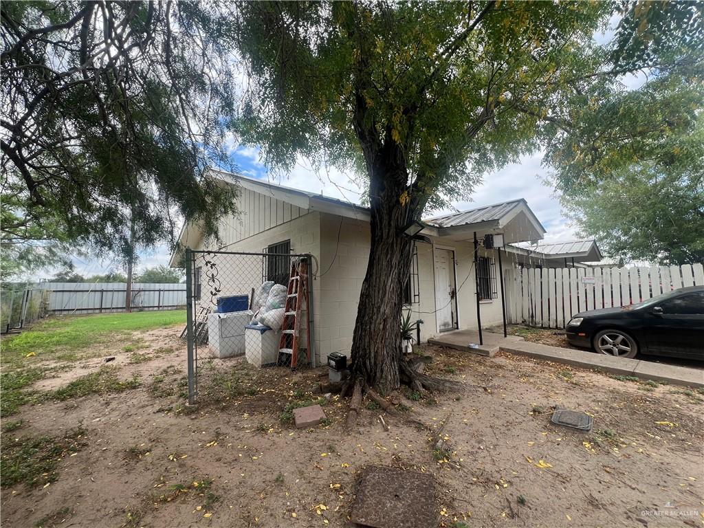 5020 La Homa Road Mission, TX 78574 - Photo 21 of 28 a view of a house with a yard and a large tree