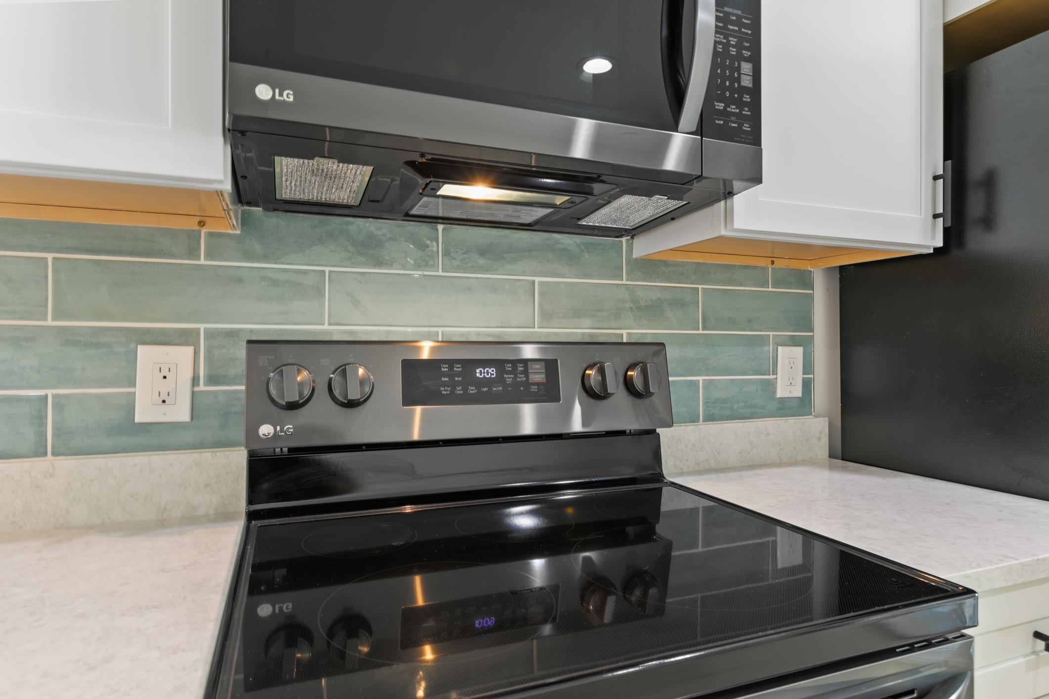 16 Sidney Street St. Augustine, FL 32084 - Photo 15 of 19 a stove top oven sitting inside of a kitchen