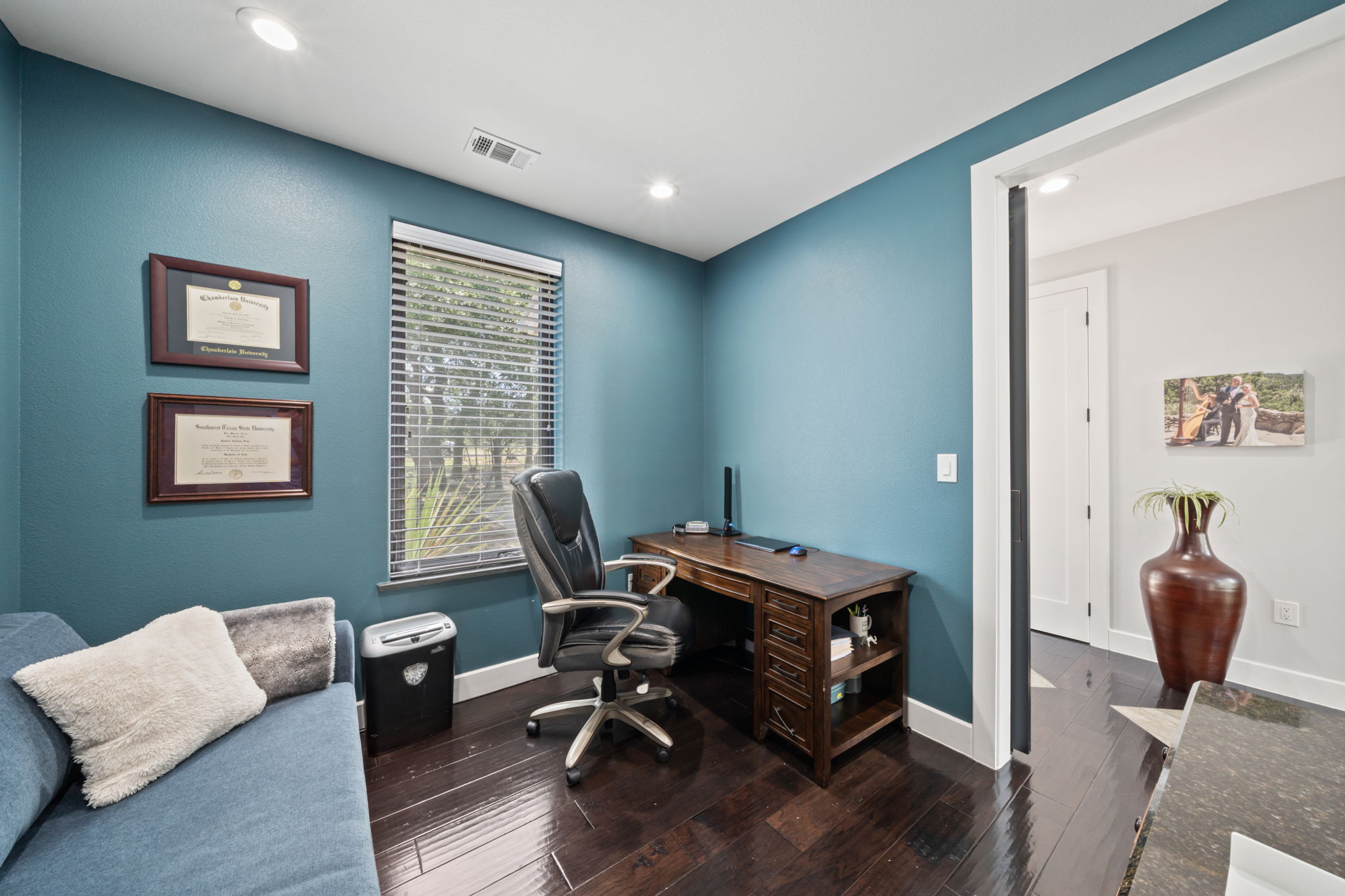 172 Bluff Trail Dripping Springs, TX 78620 - Photo 24 of 40 a view of a workspace with furniture and a window