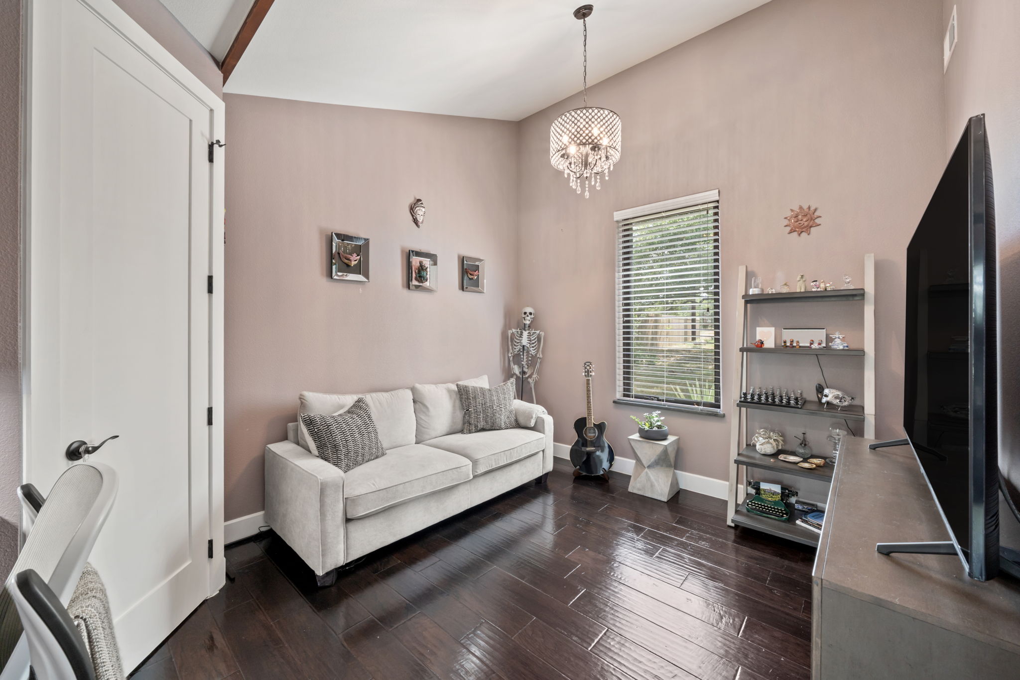172 Bluff Trail Dripping Springs, TX 78620 - Photo 25 of 40 a living room with furniture and a flat screen tv