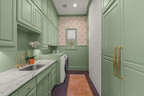 a bathroom with a sink a toilet and mirror