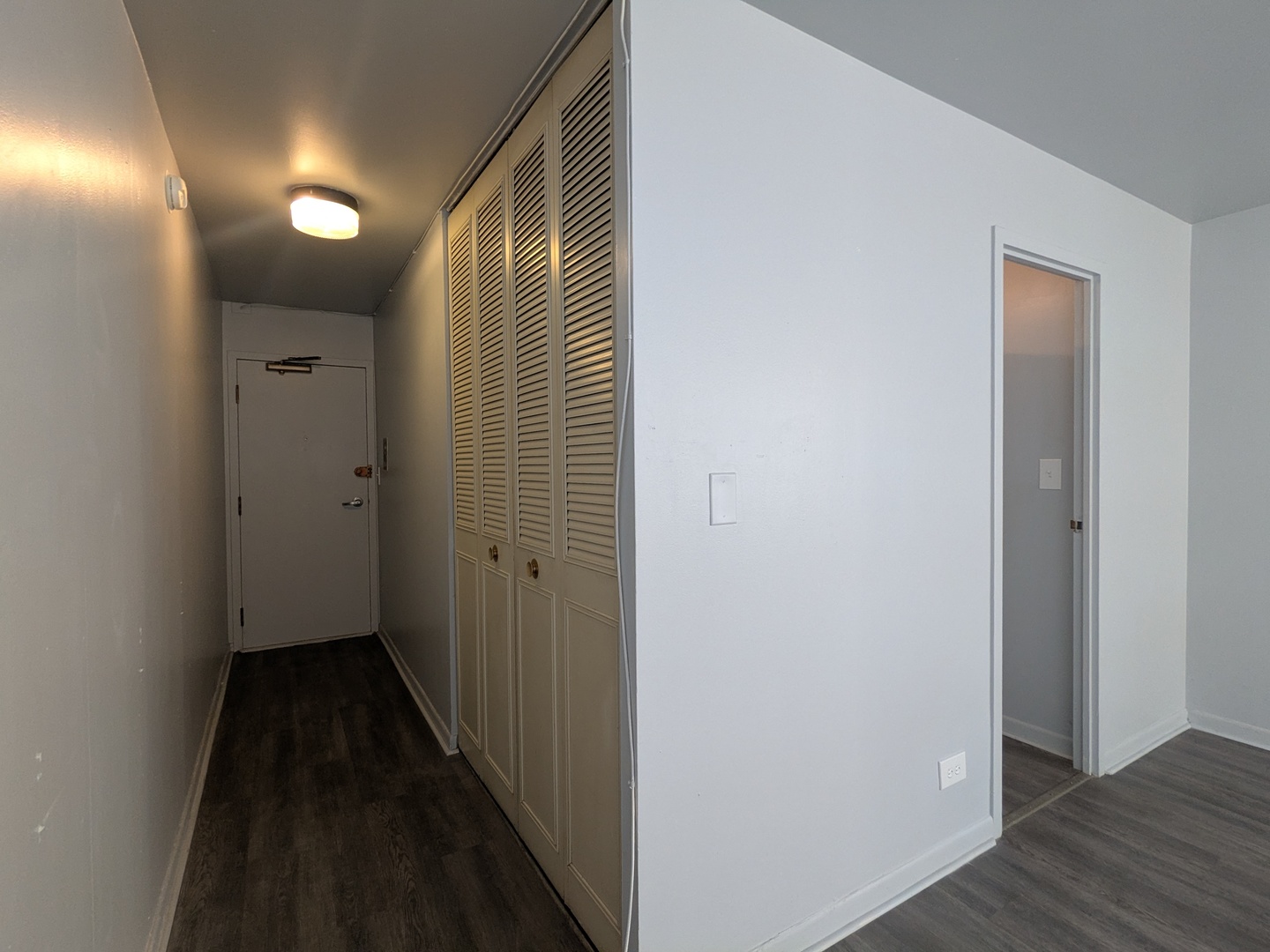 6171 North Sheridan Road, Unit 1408 Chicago, IL 60660 - Photo 11 of 24 a view of hallway with wooden floor