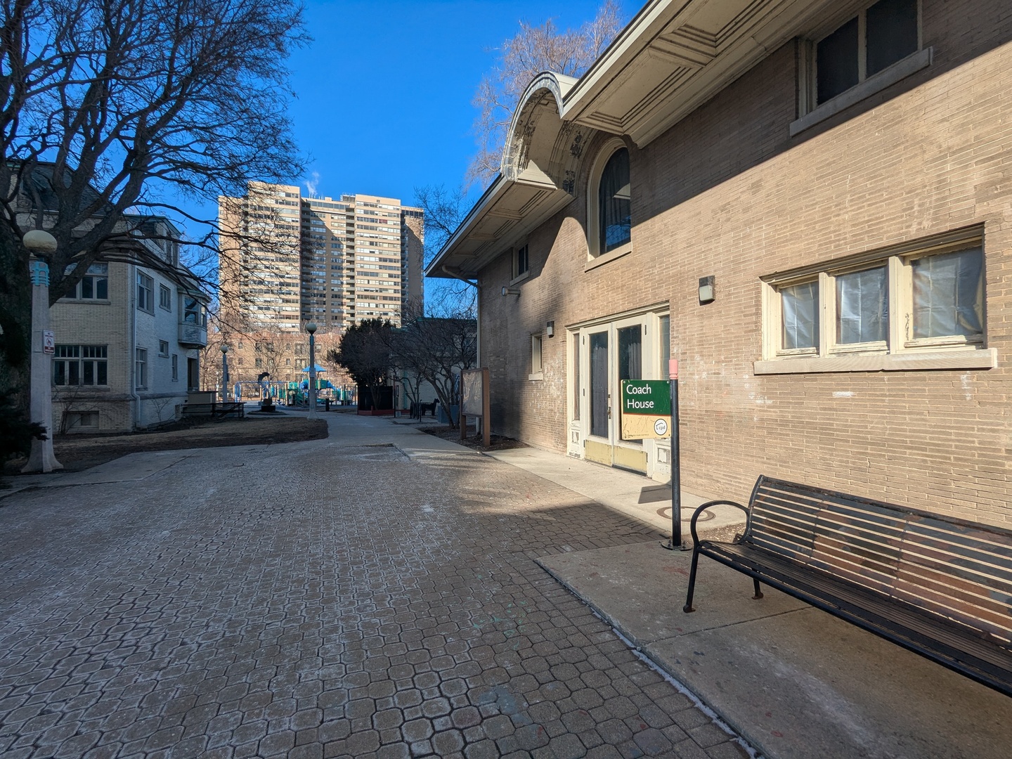 6171 North Sheridan Road, Unit 1408 Chicago, IL 60660 - Photo 16 of 24 a view of a building with a bench
