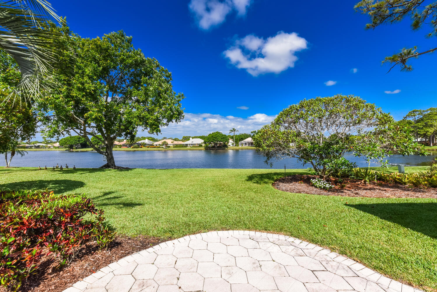 3510 Southeast Cambridge Drive Stuart, FL 34997 - Photo 29 of 54 a view of a golf course with a house