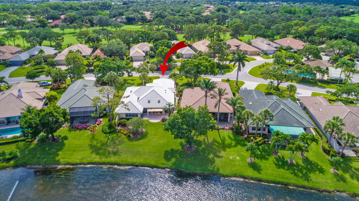 3510 Southeast Cambridge Drive Stuart, FL 34997 - Photo 3 of 54 an aerial view of multiple house