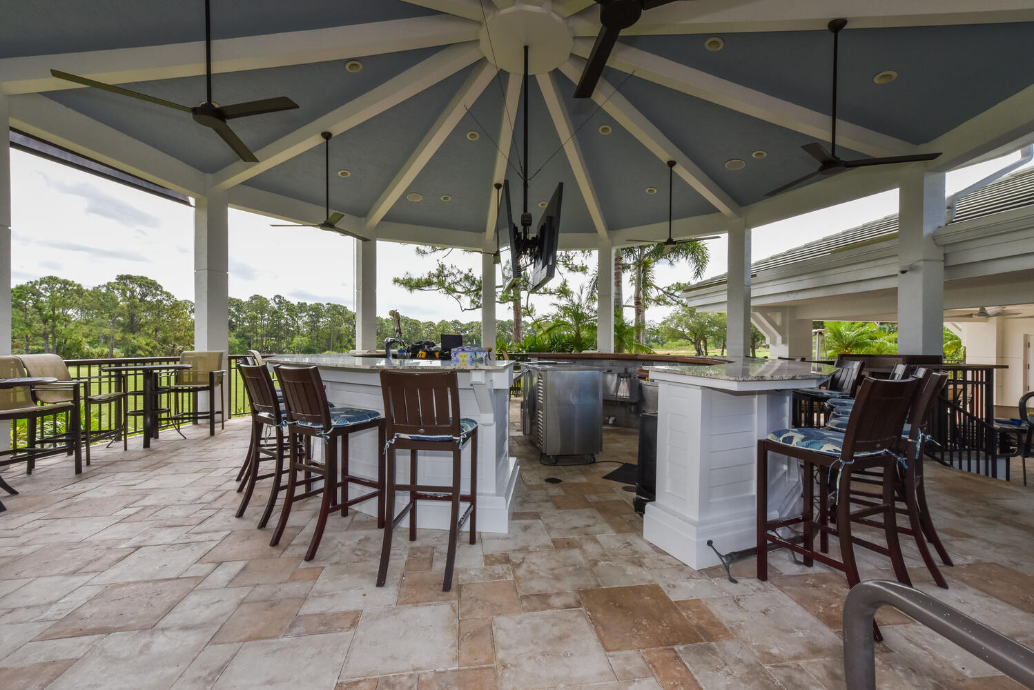 3510 Southeast Cambridge Drive Stuart, FL 34997 - Photo 43 of 54 a view of a dining room with furniture and chandelier