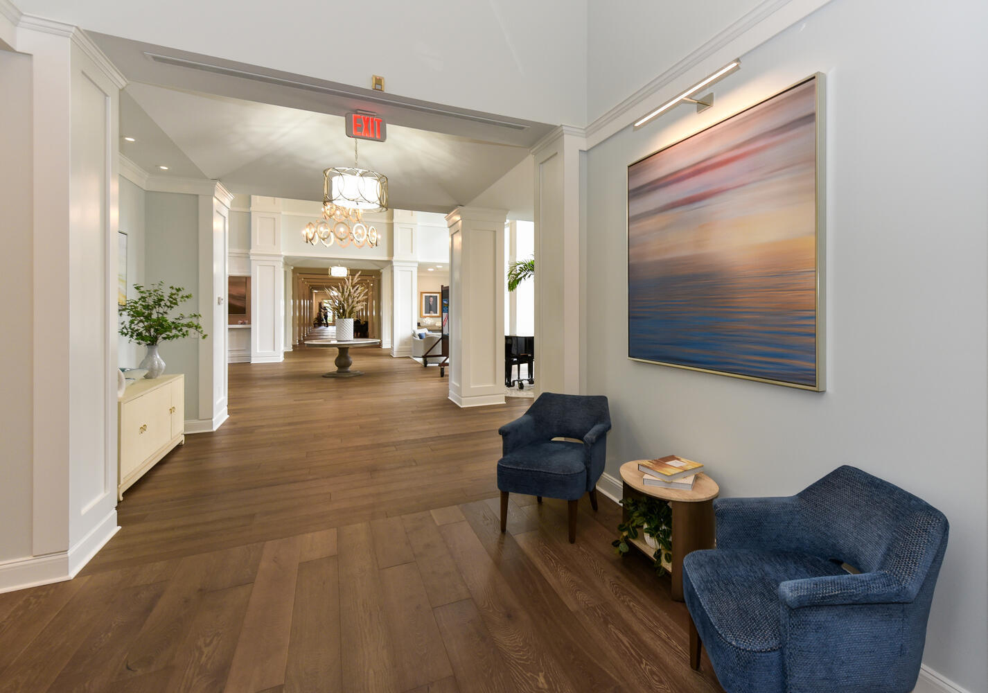 3510 Southeast Cambridge Drive Stuart, FL 34997 - Photo 47 of 54 a living room with furniture and a painting on the wall