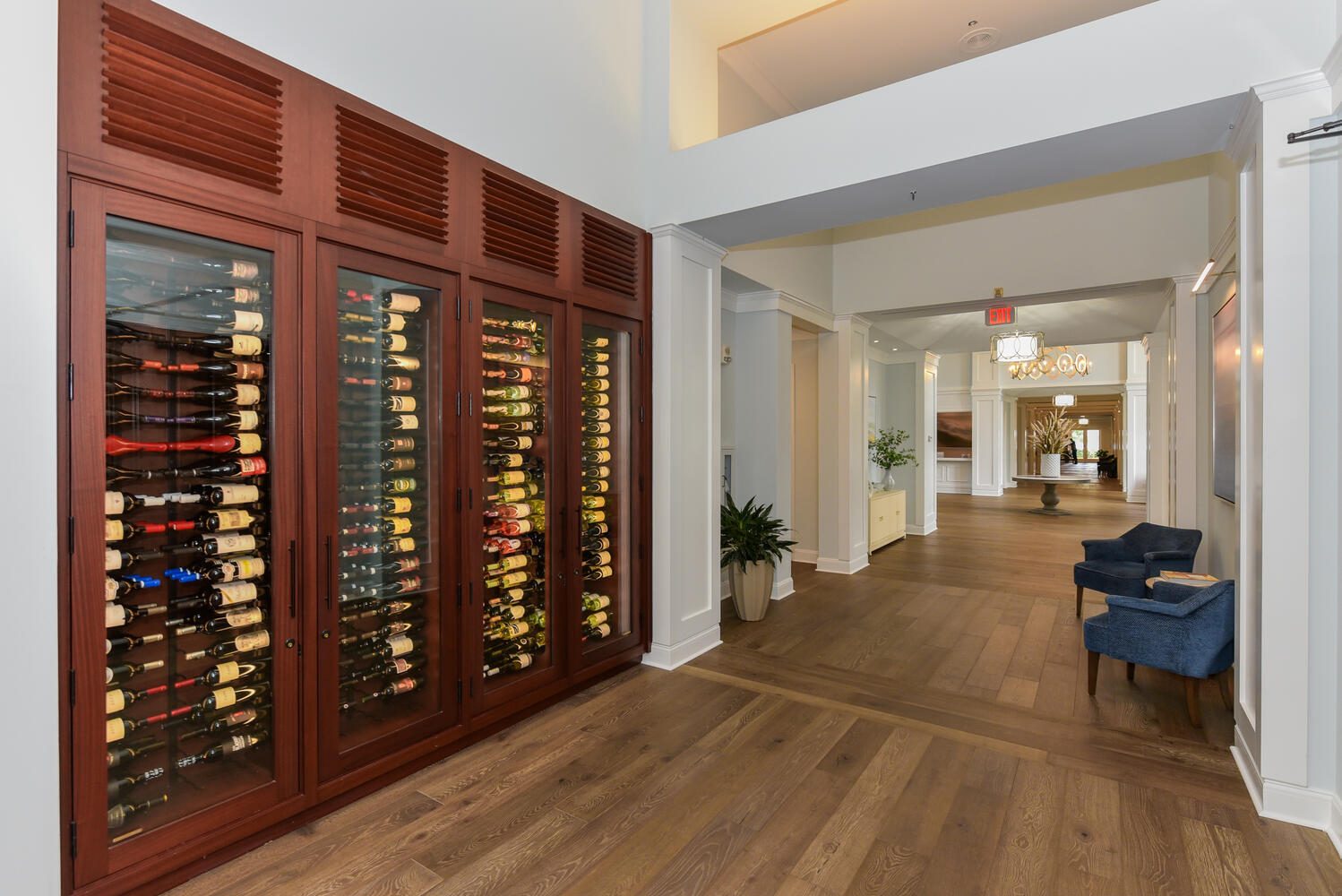 3510 Southeast Cambridge Drive Stuart, FL 34997 - Photo 48 of 54 a view of a hallway with wooden floor and furniture