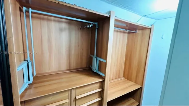 a living room filled with furniture and a table