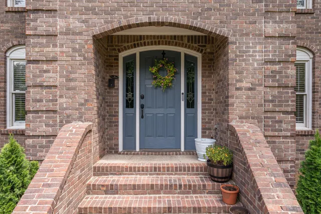 a view of a hallway with staircase