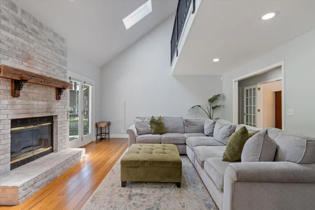 a kitchen with stainless steel appliances granite countertop a stove a sink dishwasher and a refrigerator