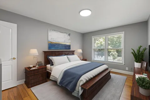 a bathroom with a double vanity sink and mirror