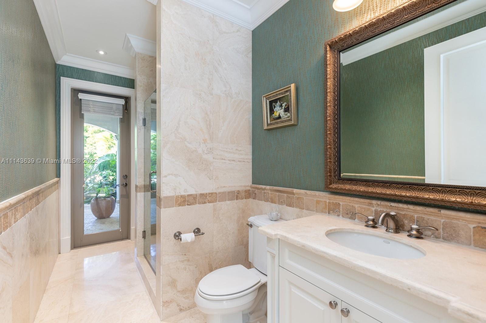 8230 Southwest 53rd Avenue Miami, FL 33143 - Photo 17 of 34 a bathroom with a sink a toilet and shower