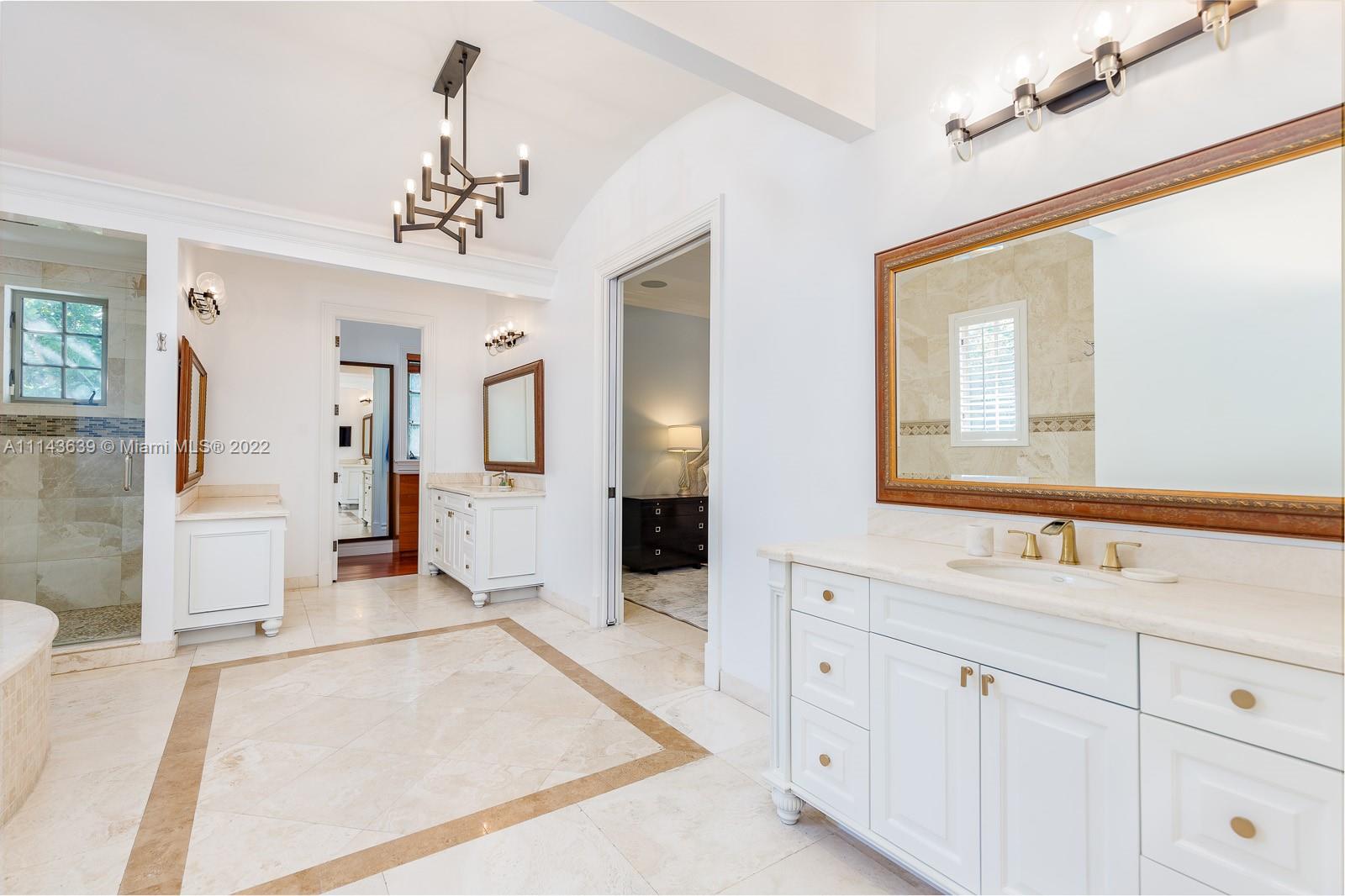 8230 Southwest 53rd Avenue Miami, FL 33143 - Photo 20 of 34 a spacious bathroom with a sink and a mirror