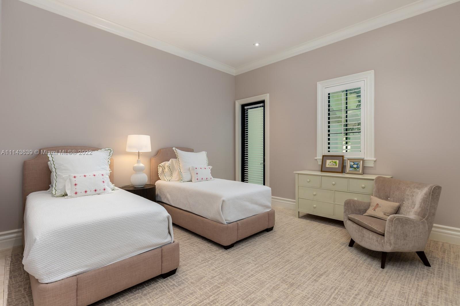 8230 Southwest 53rd Avenue Miami, FL 33143 - Photo 25 of 34 a bedroom with two beds and a couch