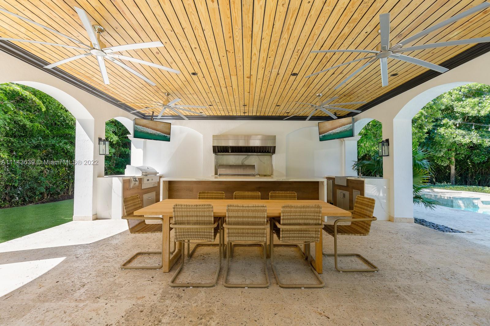 8230 Southwest 53rd Avenue Miami, FL 33143 - Photo 26 of 34 a patio with table and chairs