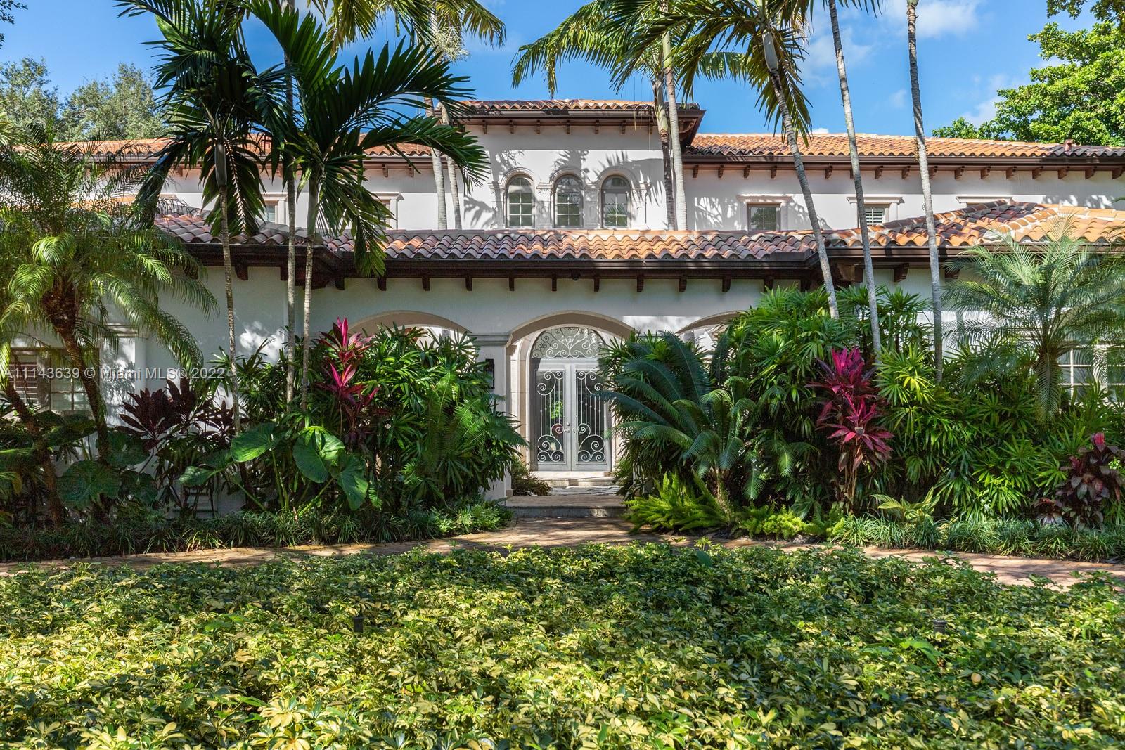 8230 Southwest 53rd Avenue Miami, FL 33143 - Photo 3 of 34 a front view of house with outdoor space and swimming pool