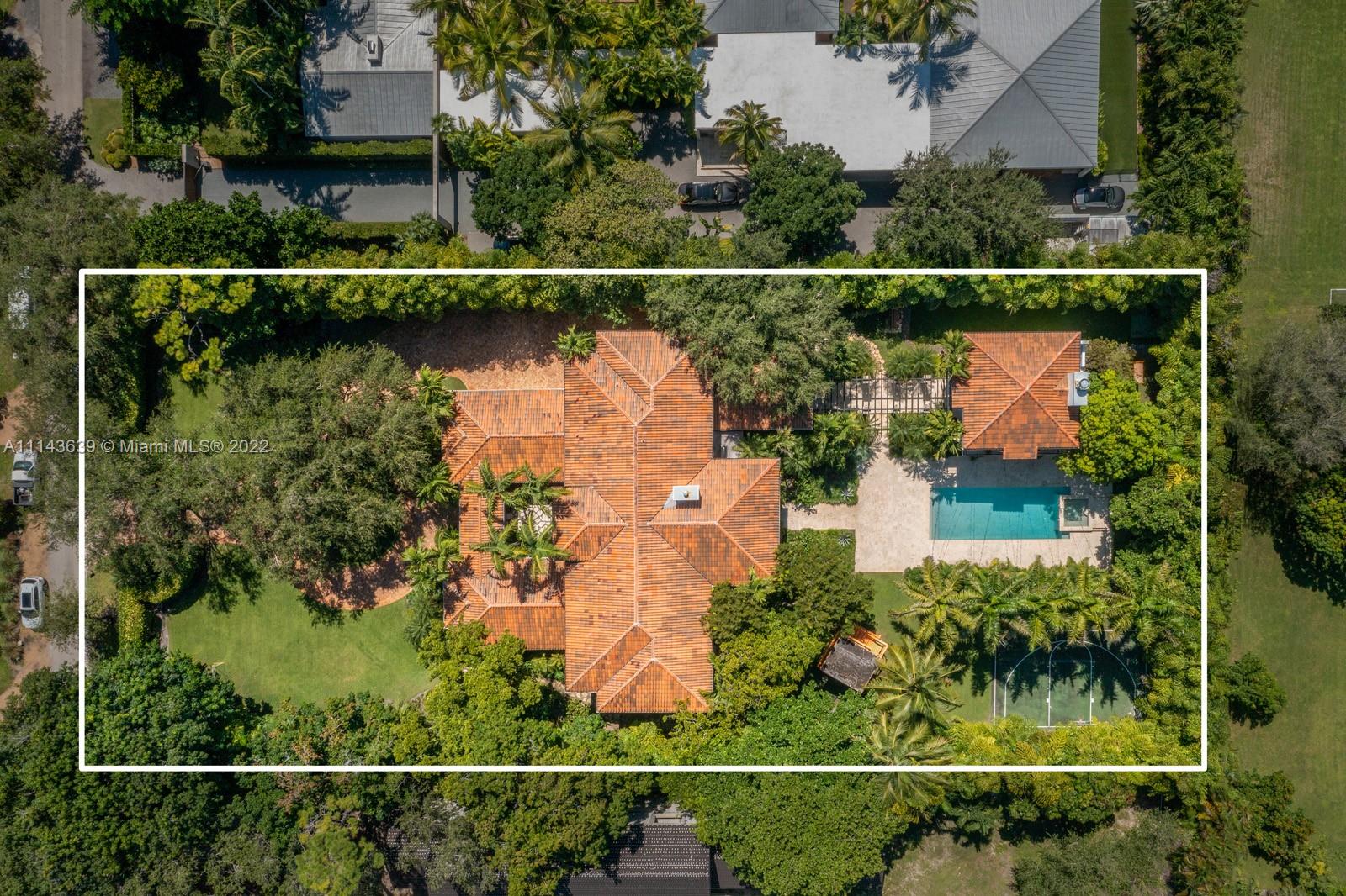 8230 Southwest 53rd Avenue Miami, FL 33143 - Photo 32 of 34 an aerial view of a house with a garden and yard