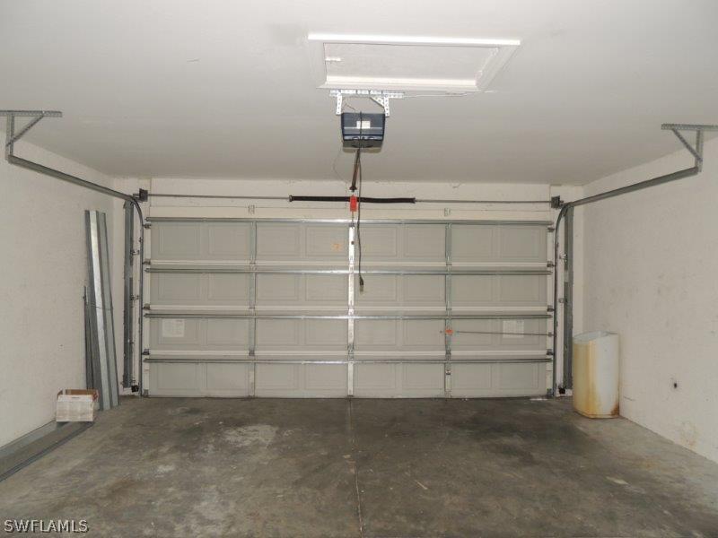 17416 Kentucky Road Fort Myers, FL 33967 - Photo 12 of 13 a view of a room with shelf and racks on the wall