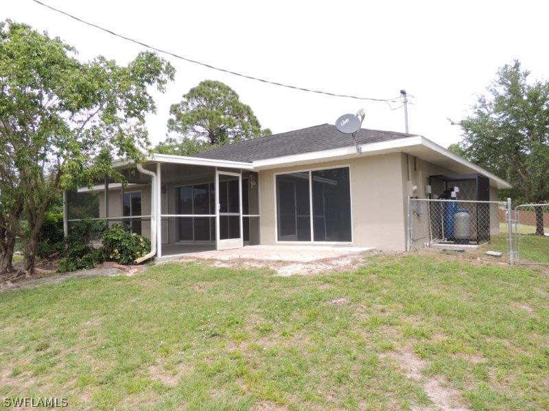 17416 Kentucky Road Fort Myers, FL 33967 - Photo 13 of 13 a view of a house with a yard and sitting area
