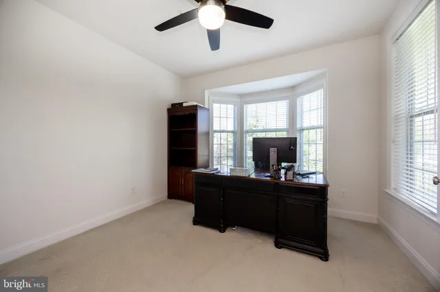 a room with furniture and window in it