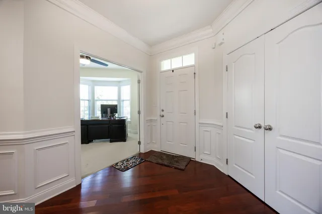 a view of a livingroom with wooden floor
