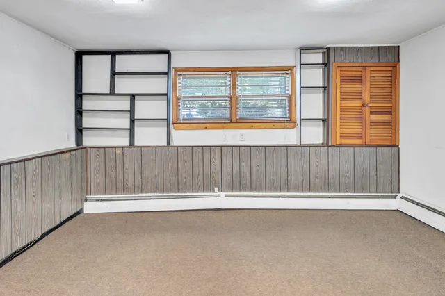 an empty room with windows