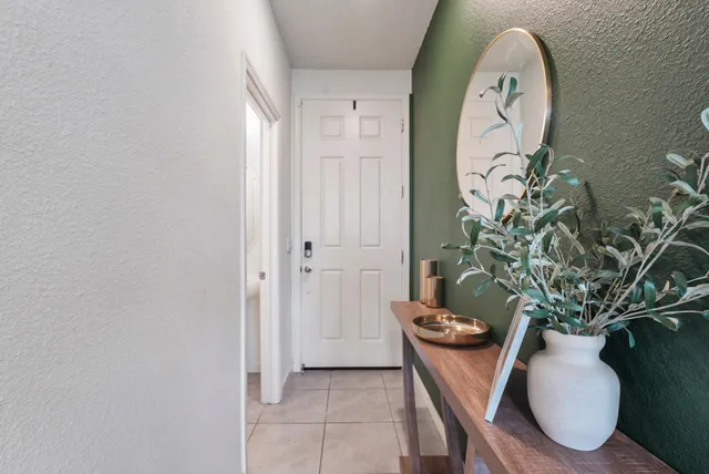 a vase of flowers sitting on a table
