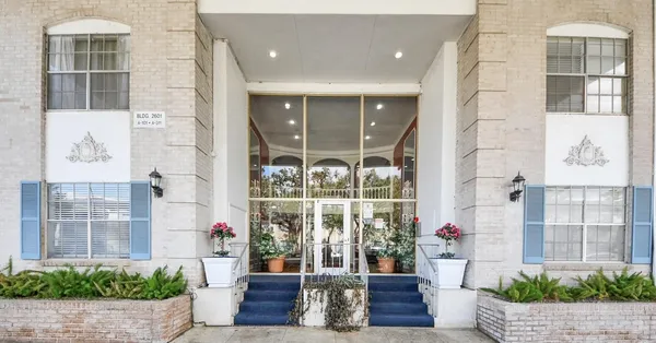 a view of a lobby with a potted plant