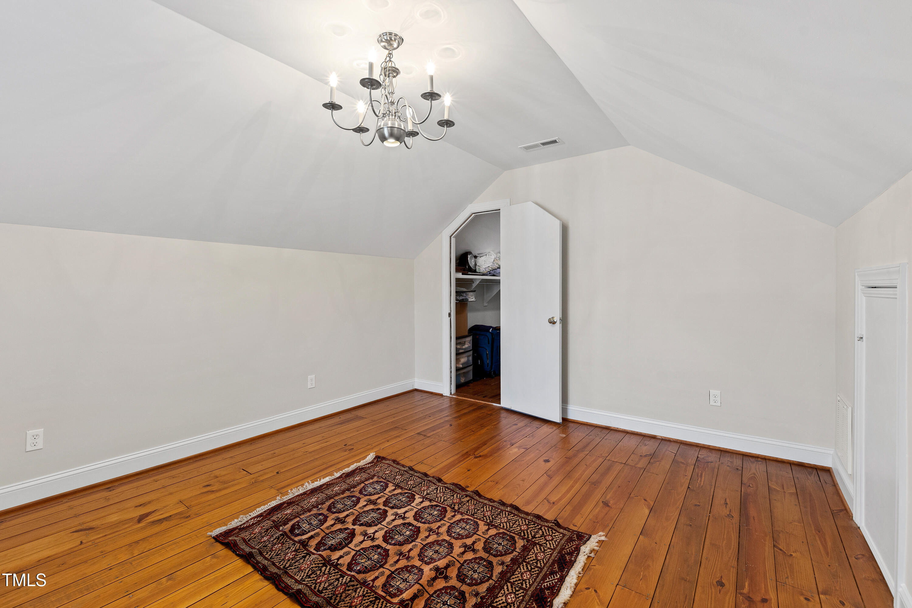 2147 Wake Drive Raleigh, NC 27608 - Photo 48 of 48 wooden floor in an empty room with a window