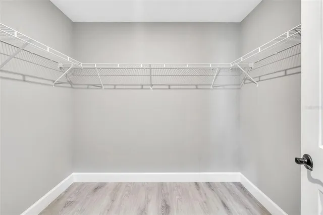 a view of a room with racks on the wall