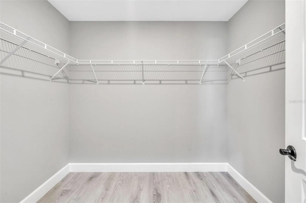 6193 Cabal Lane Port Charlotte, FL 33981 - Photo 9 of 28 a view of a room with racks on the wall