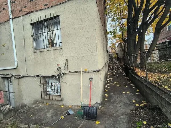 a view of a house with a street