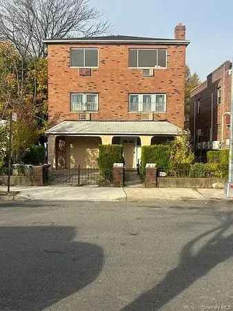 front view of a building with a street