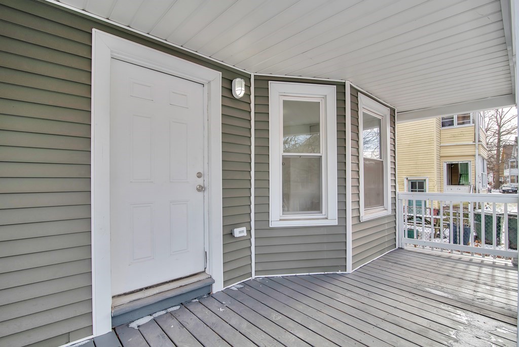 131 Ranney Street Springfield, MA 01108 - Photo 3 of 25 a view of outdoor space with deck and kitchen view