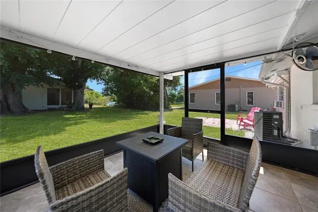 a view of outdoor space yard deck patio and fire pit