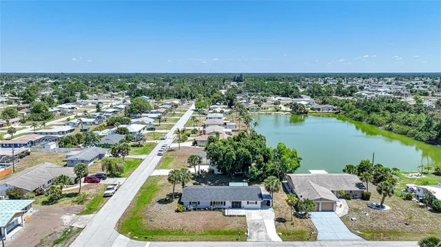 a view of a lake in middle of the town