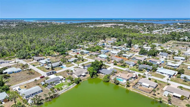 an aerial view of a city with lots of residential buildings