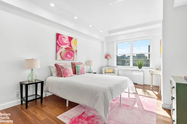 a view of hallway with wooden floor