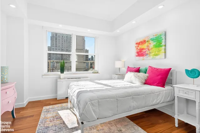a bathroom with a toilet sink and shower