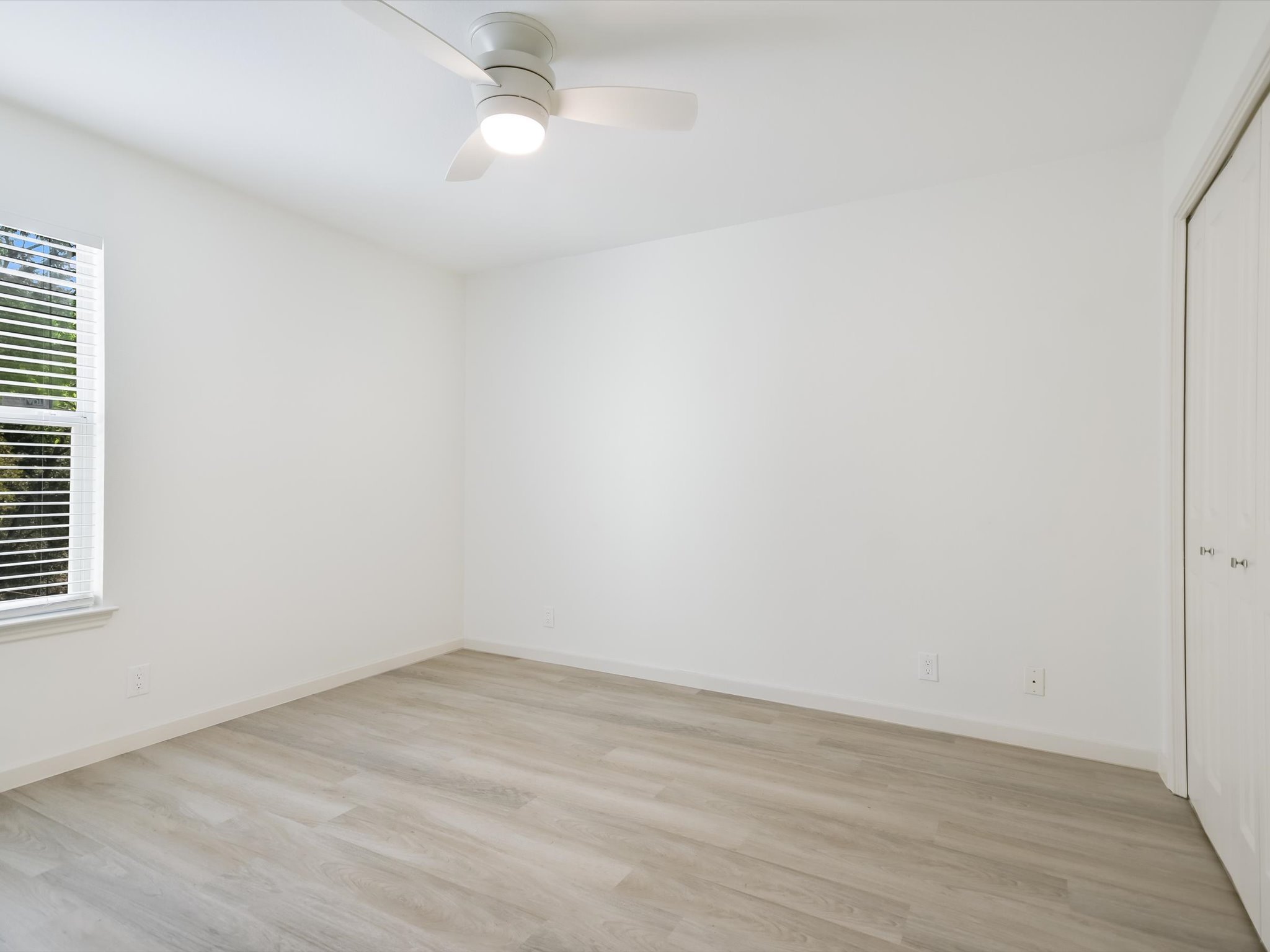 5104 Delores Avenue, Unit B Austin, TX 78721 - Photo 7 of 12 wooden floor in an empty room