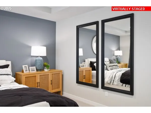 a living room with furniture and a lamp